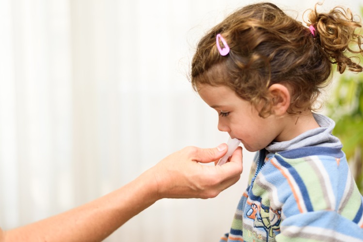 child using saliva test